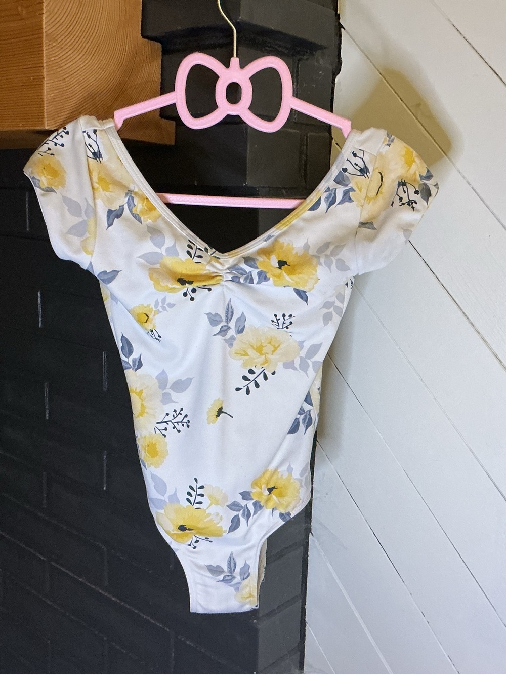 Eleve dance wear white with yellow flowers,